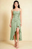 Front view of the LVLVS Ada light green midi dress, showing the draped neckline, thin straps and high-low ruffled skirt.
