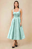 Front view of the LVLVS Alberta mint midi dress, showing the pearl-trimmed square neckline, fitted bodice and full flared skirt.