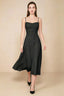 Front view of the LVLVS Alina black midi dress, showing the draped neckline, thin shoulder straps and flowing flared skirt.