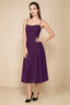 Front view of the LVLVS Alina grape midi dress, showing the draped neckline, thin shoulder straps and flowing flared skirt.
