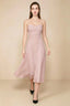 Front view of the LVLVS Alina powder pink midi dress, showing the draped neckline, thin shoulder straps and flowing flared skirt.