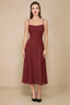 Front view of the LVLVS Alina rust midi dress, showing the draped neckline, thin shoulder straps and flowing flared skirt.