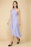 Front view of the LVLVS Alma lavender midi dress, showing the asymmetric neckline, draped neck scarf and flowing uneven hem.