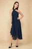 Front view of the LVLVS Alma navy midi dress, showing the asymmetric neckline, draped neck scarf and flowing uneven hem.
