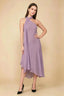 Front view of the LVLVS Alma wisteria midi dress, showing the asymmetric neckline, draped neck scarf and flowing uneven hem.
