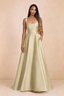 Front studio view of Becky butter yellow satin maxi dress showing the square neckline, pleated bodice and full A-line skirt