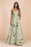 Front studio view of Becky green floral satin maxi dress showing the square neckline, pleated bodice and full A-line skirt
