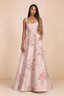 Front studio view of Becky pink floral satin maxi dress showing the square neckline, pleated bodice and full A-line skirt