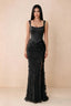 Front studio view of Betsy black square-neck corset maxi dress with a floral skirt and high slit