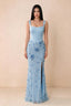 Front studio view of Betsy sky blue square-neck corset maxi dress with a floral skirt and high slit