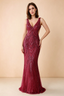 Front studio view of Betty burgundy sequin maxi dress showing the V-neck and geometric pattern