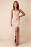 Front studio view of Brianna light pink floral maxi dress with thin straps and a high ruffle-edged opening