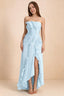 Front studio view of Camilla sky blue strapless maxi dress with pleats, cascading ruffles and an asymmetric opening