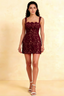 Model wearing Claire burgundy lace A-line square neck mini dress for homecoming, semi-formal event, detailed front view.