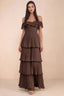 Front studio view of Seraphina truffle tiered ruffle maxi dress with a long flowing skirt