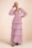 Front studio view of Sienna candy pink tiered pleated maxi dress with a long flowing skirt