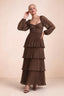 Front studio view of Sienna mocha tiered pleated maxi dress with a long flowing skirt