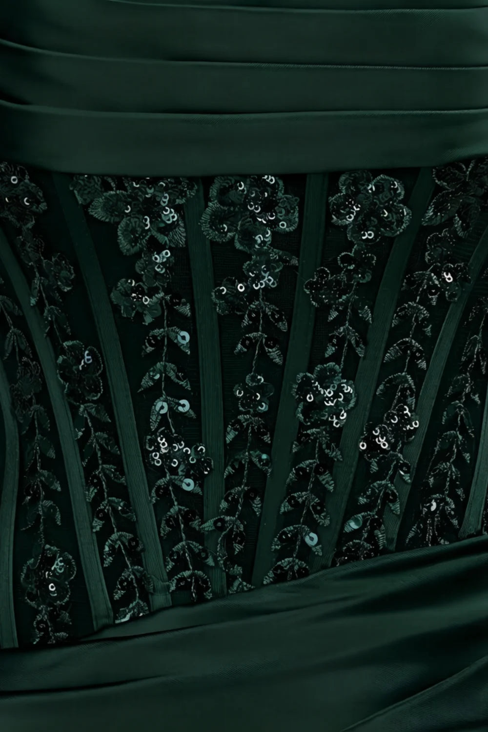 Close up fabric detail Clara emerald dress showcasing vertical sequin lace patterns on satin