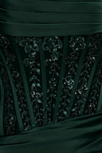Close up fabric detail Clara emerald dress showcasing vertical sequin lace patterns on satin