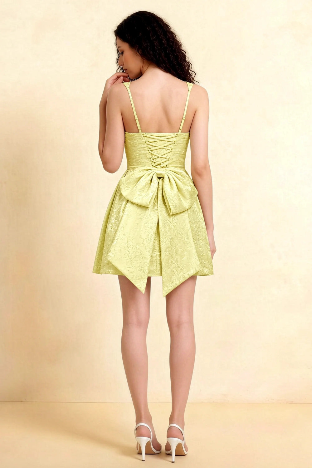 Translation missing: en.Yellow jacquard mini dress with lace-up back and bow detail Adelaide Dress for special occasions content.product_image_secondary
