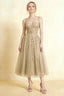 Front view of the LVLVS Adeline champagne midi dress, showing the sweetheart neckline, floral lace straps and flared layered skirt.