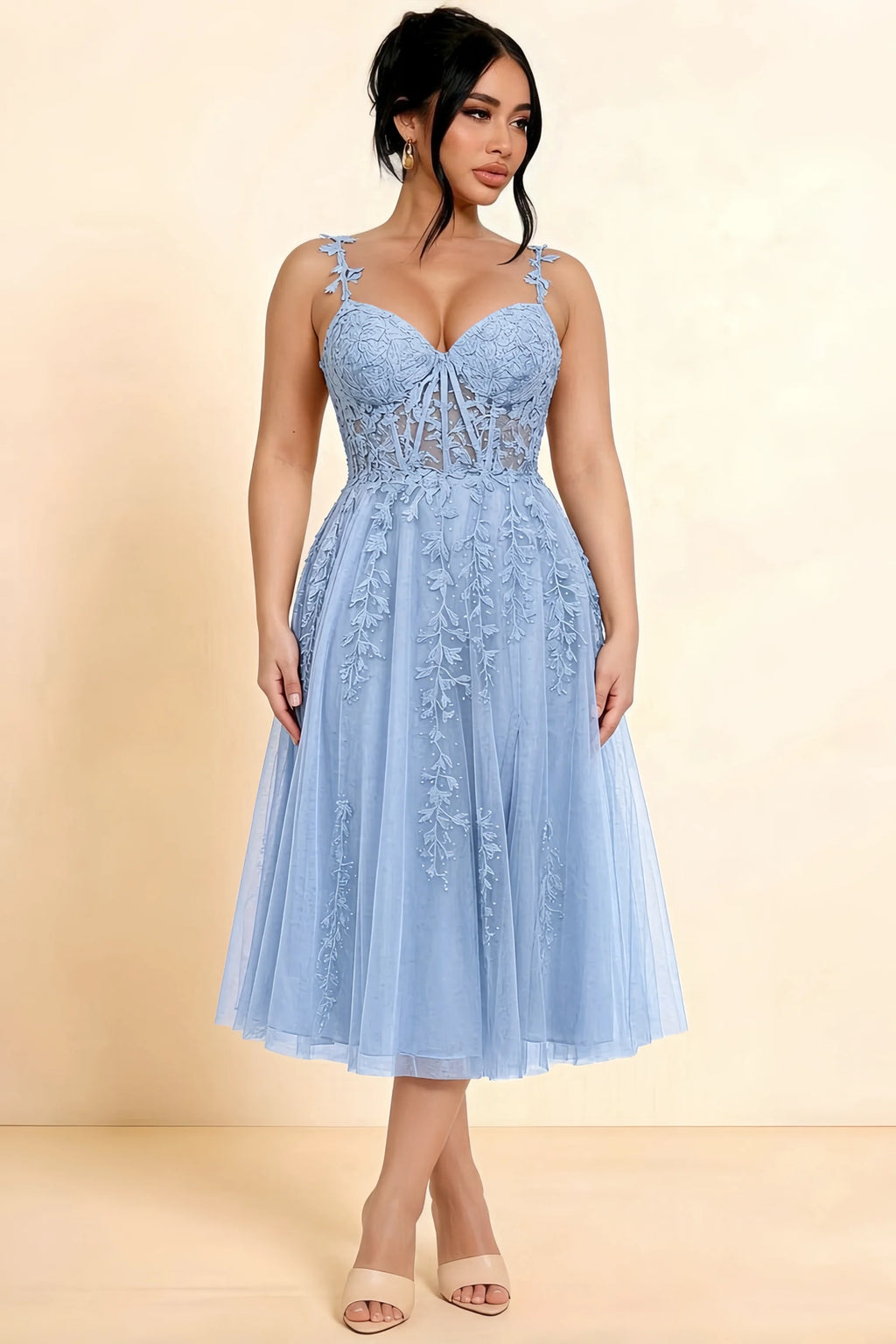 Full-length view of a model wearing the LVLVS Adeline sky blue midi dress, showing the fitted lace bodice and flared calf-length skirt.
