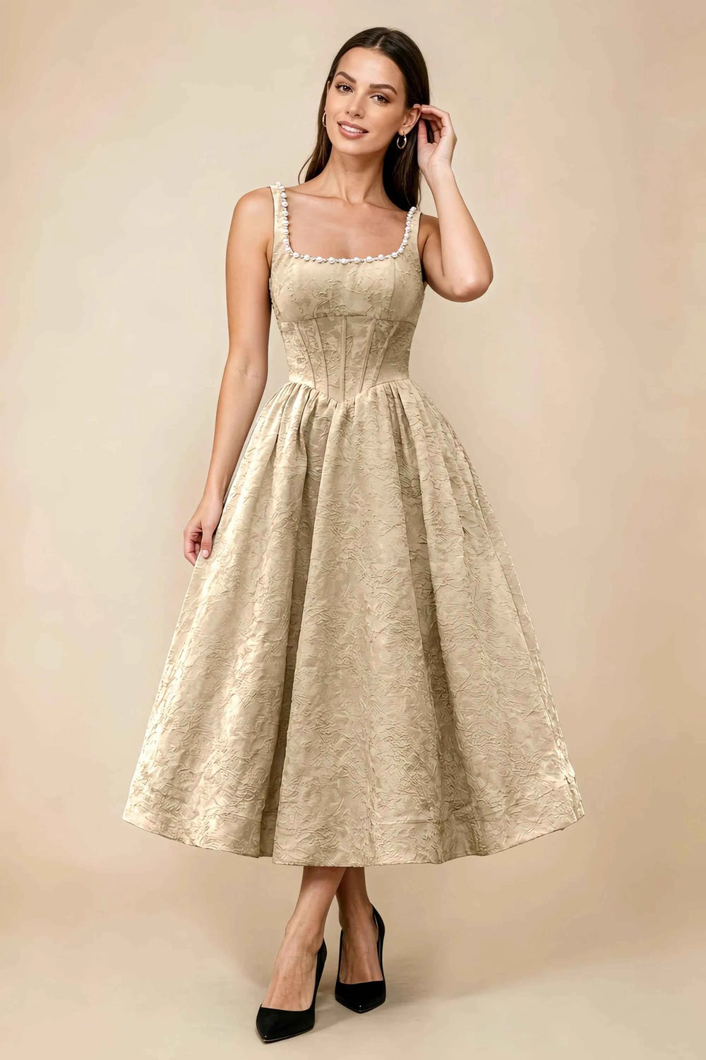 Translation missing: en.Front view of the LVLVS Alberta champagne midi dress, showing the pearl-trimmed square neckline, fitted bodice and full flared skirt. content.product_image_main