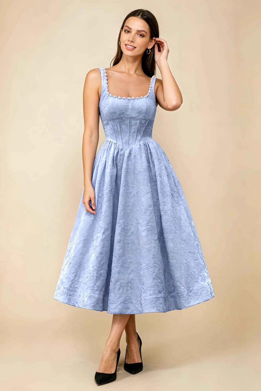 Translation missing: en.Front view of the LVLVS Alberta light blue midi dress, showing the pearl-trimmed square neckline, fitted bodice and full flared skirt. content.product_image_main