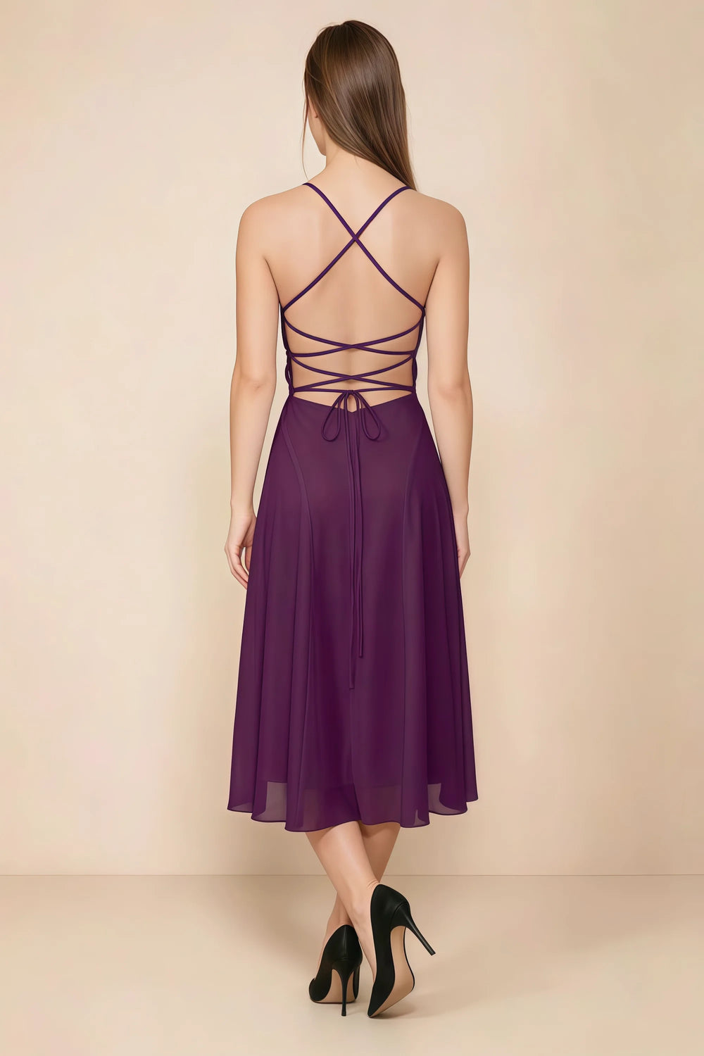 Translation missing: en.Back view of the LVLVS Alina grape midi dress, showing the open back, crisscross straps and lace-up waist ties. content.product_image_secondary