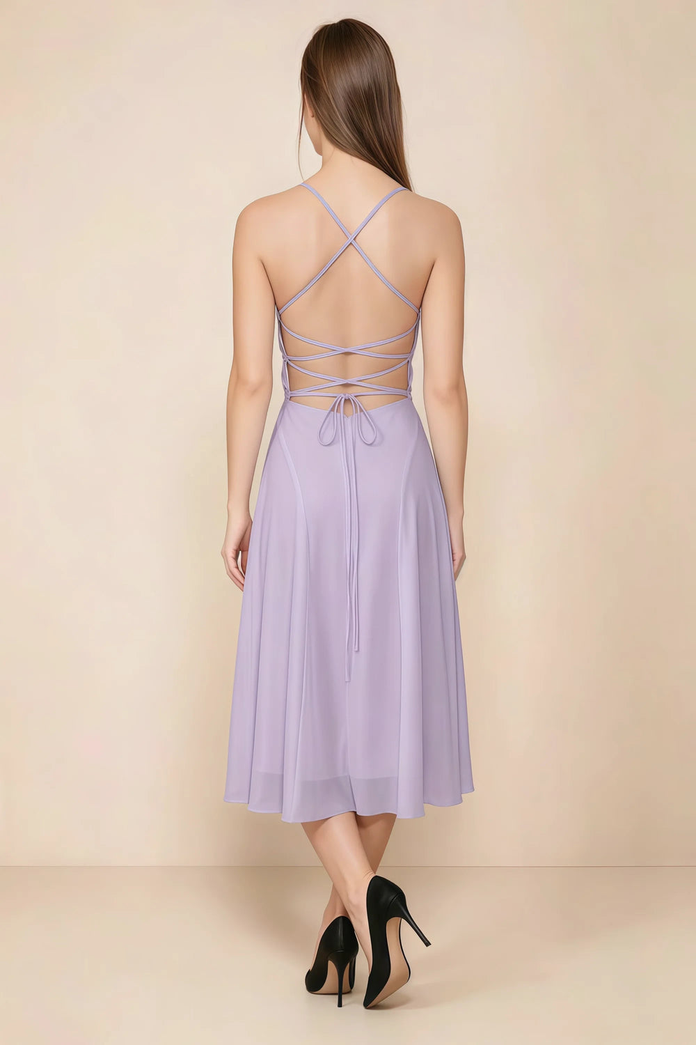 Translation missing: en.Back view of the LVLVS Alina lilac midi dress, showing the open back, crisscross straps and lace-up waist ties. content.product_image_secondary