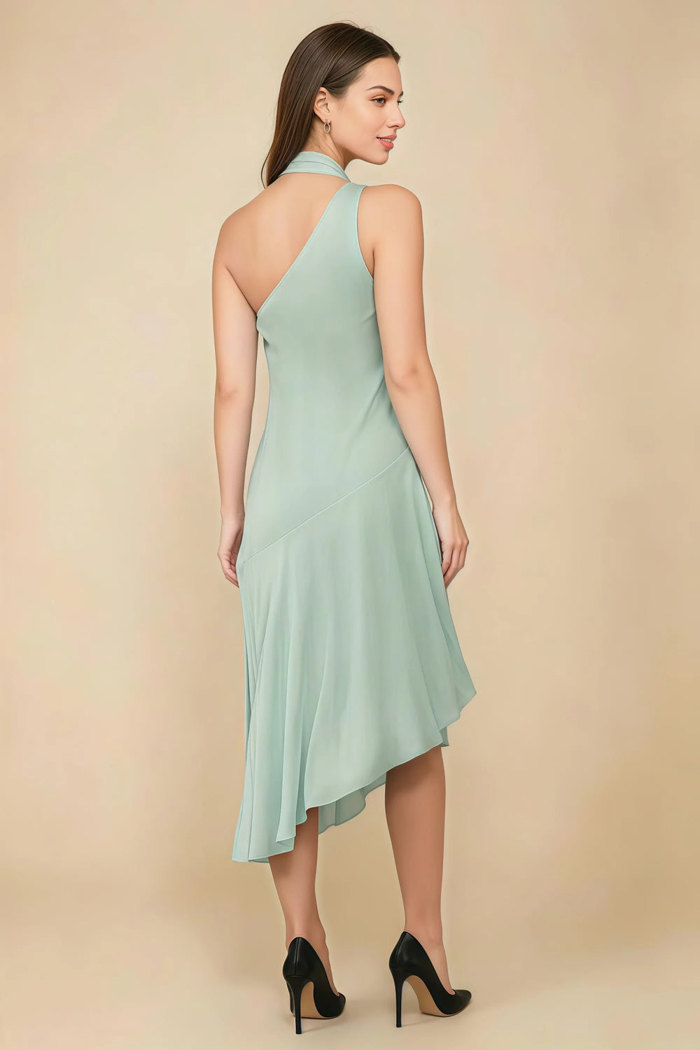 Translation missing: en.Rear three-quarter view of the LVLVS Alma agave midi dress, showing the diagonal back neckline and asymmetric midi skirt. content.product_image_secondary
