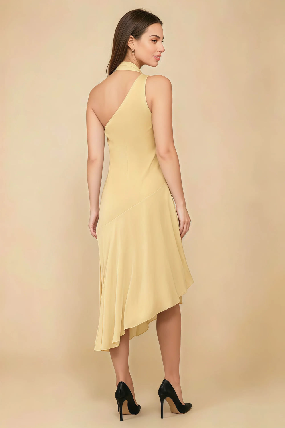 Translation missing: en.Rear three-quarter view of the LVLVS Alma lemon midi dress, showing the diagonal back neckline and asymmetric midi skirt. content.product_image_secondary