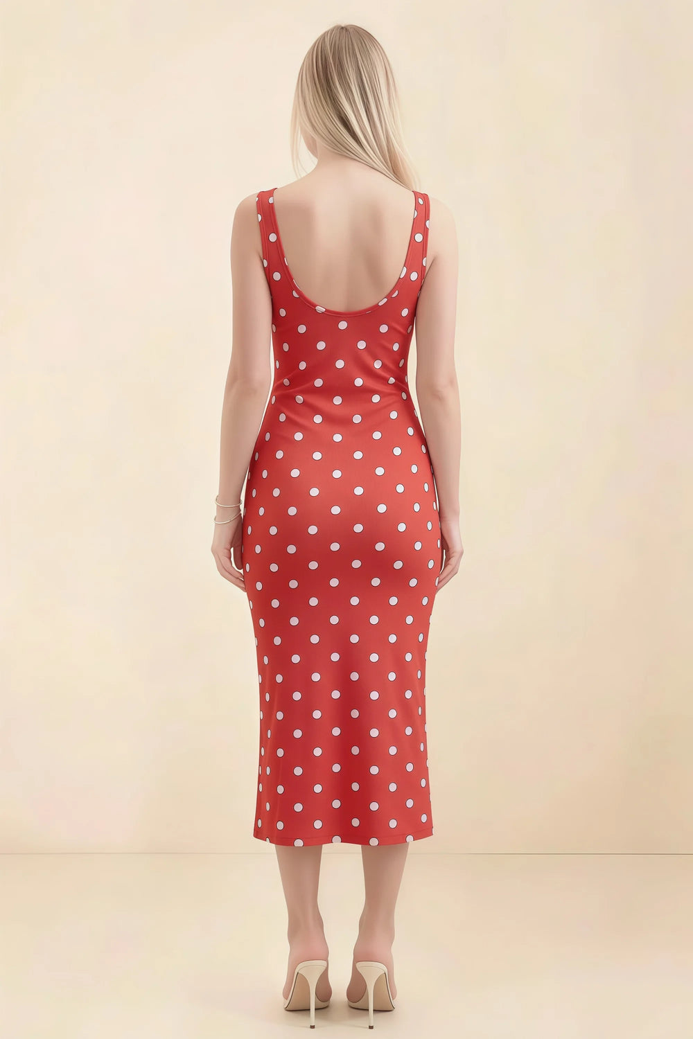 Translation missing: en.Back view of the LVLVS Alvina red polka dot midi dress, showing the low scoop back, wide straps and fitted midi skirt. content.product_image_secondary