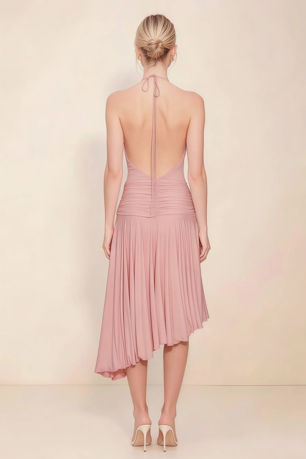 Translation missing: en.Back view of the LVLVS Amalia dusty rose midi dress, showing the low open back, halter neck ties and uneven pleated hem. content.product_image_secondary
