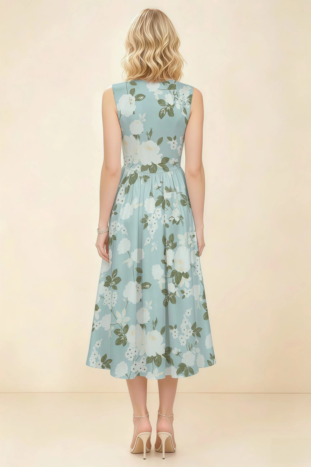 Translation missing: en.Back view of the LVLVS Anabelle blue floral midi dress, showing the covered back, fitted waist and gathered midi skirt. content.product_image_secondary