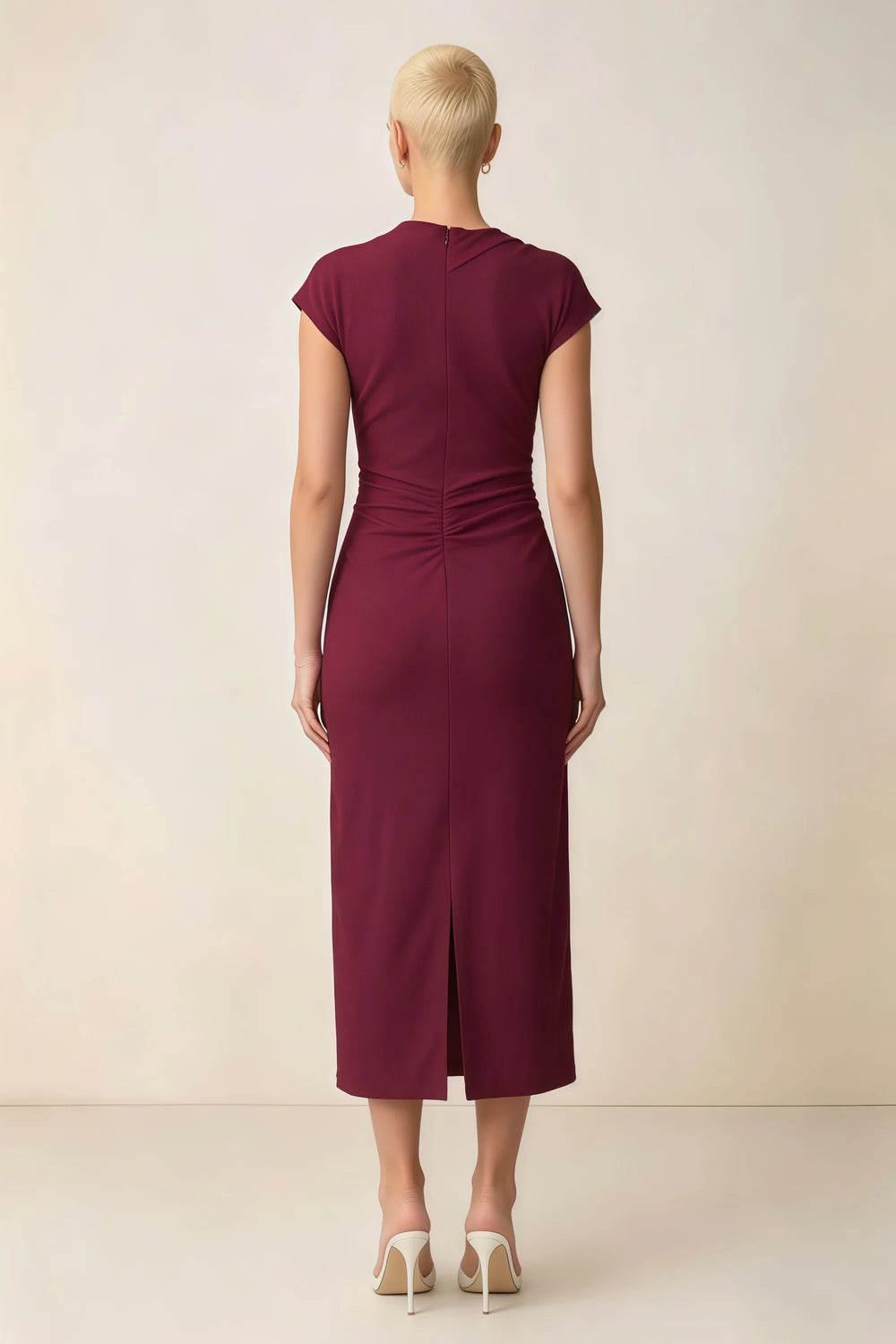 Translation missing: en.Back view of the LVLVS Anita burgundy midi dress, showing the covered back, gathered waist and center skirt slit. content.product_image_secondary