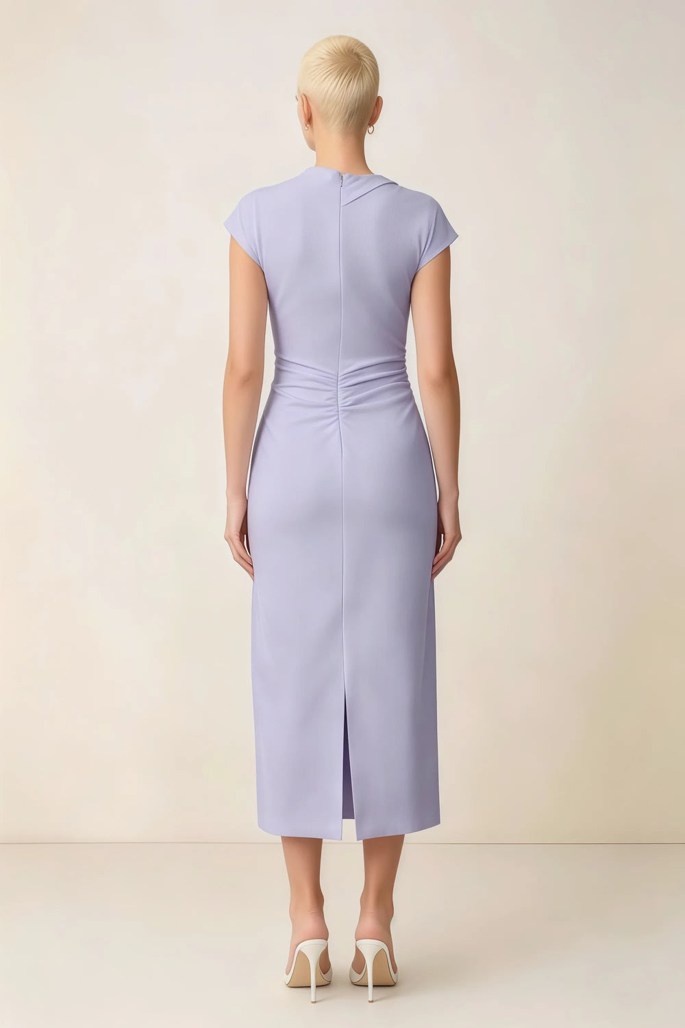 Translation missing: en.Back view of the LVLVS Anita lavender midi dress, showing the covered back, gathered waist and center skirt slit. content.product_image_secondary