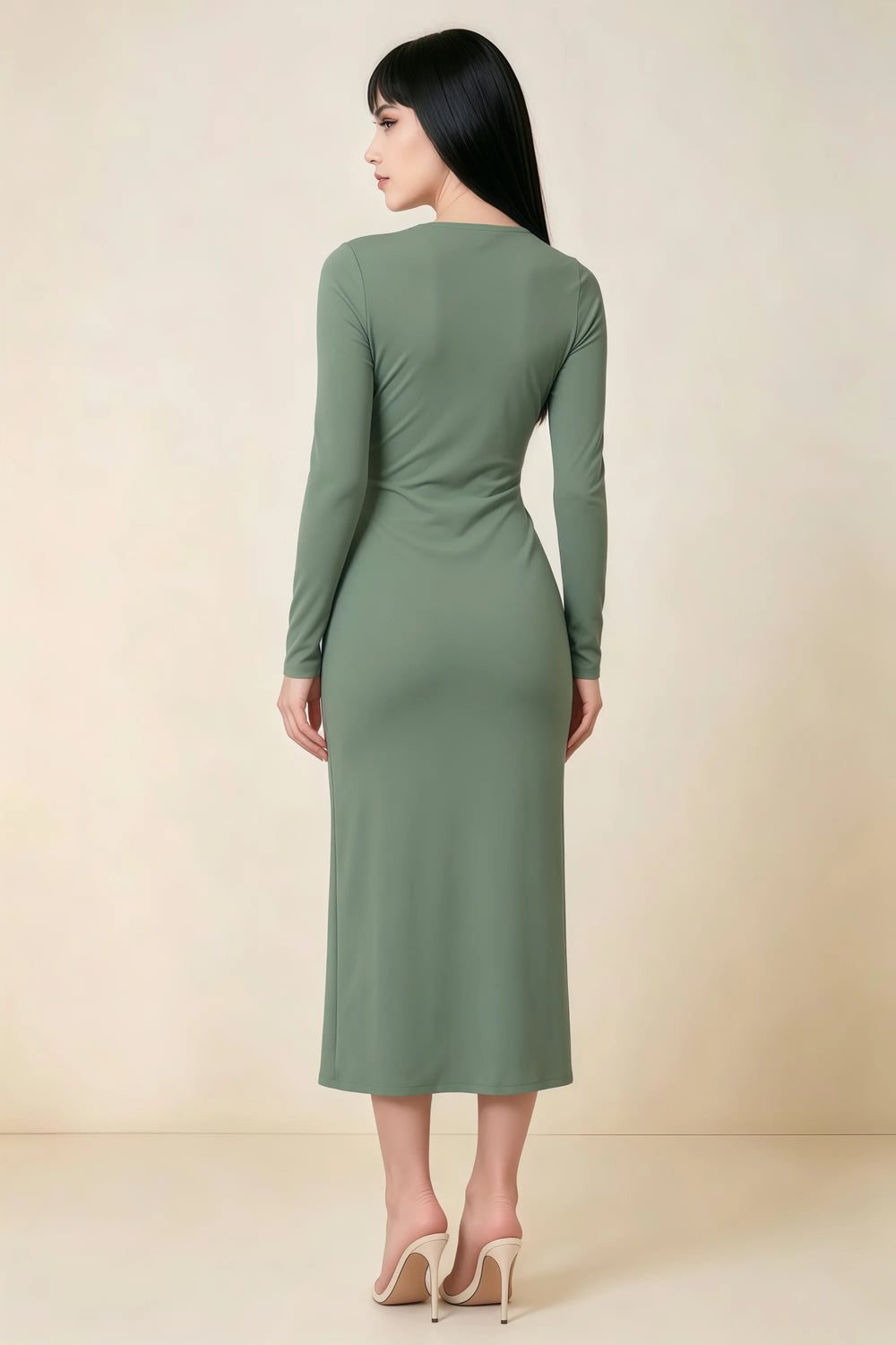 Translation missing: en.Back view of the LVLVS Antoinette eucalyptus midi dress, showing the covered back, long sleeves and shaped waist. content.product_image_secondary