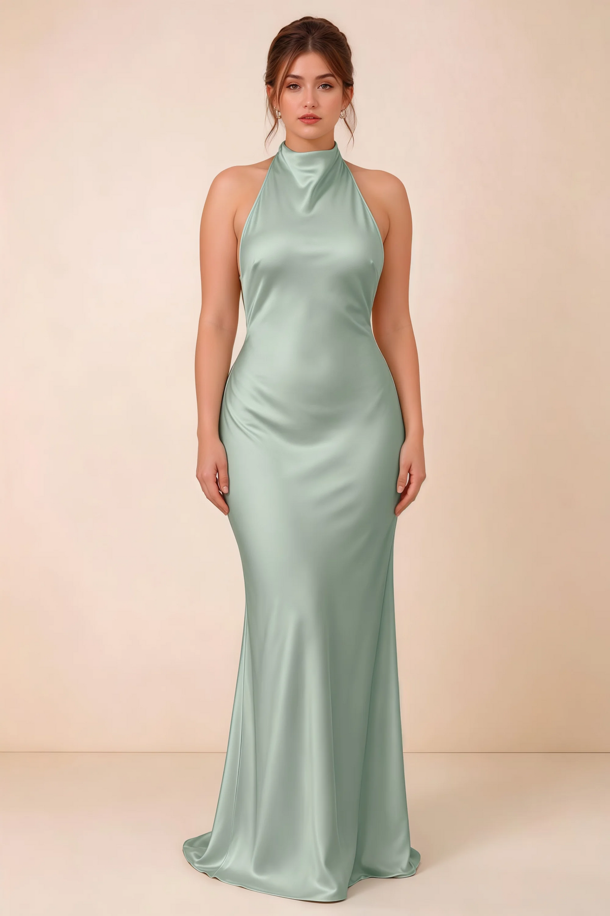 Full-length front view of the LVLVS Astrid agave satin halter maxi dress, showing the close-skimming silhouette and flared hem.