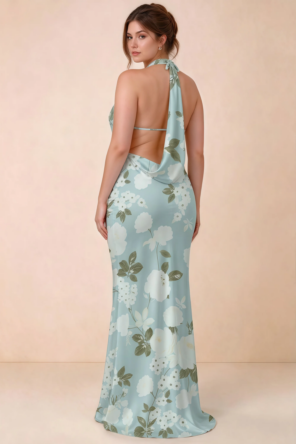 Three-quarter rear view of Astrid blue floral halter maxi dress, highlighting the cowl back.