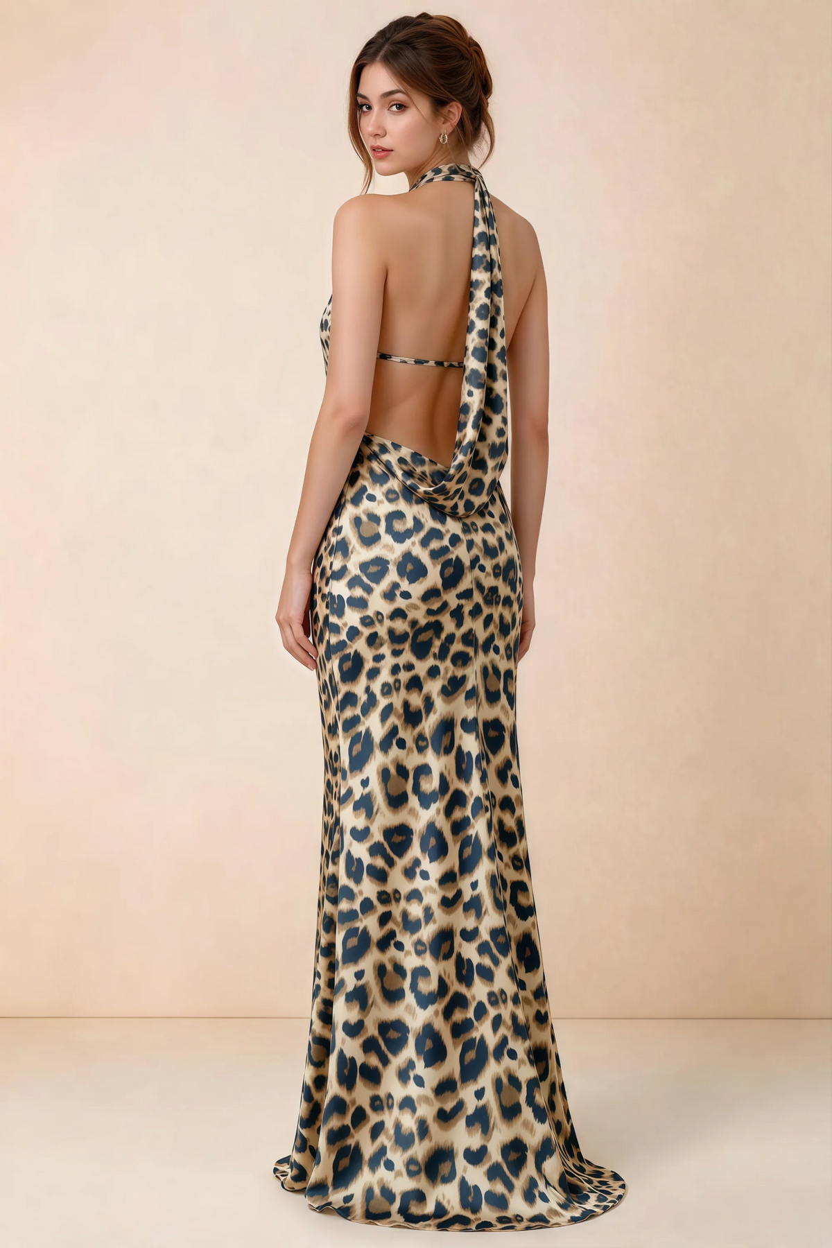 Back view of Astrid brown leopard print halter maxi dress, highlighting the open back.