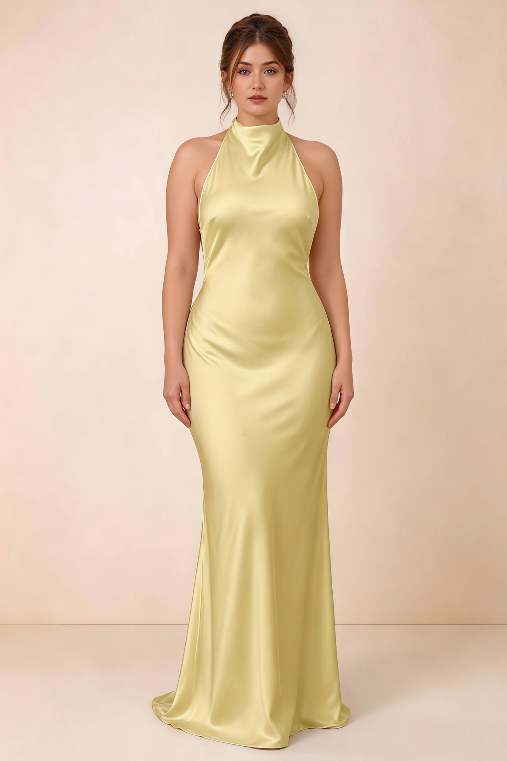 Full-length front view of the Astrid canary satin maxi dress, highlighting the body-skimming fit and gently flared hem.