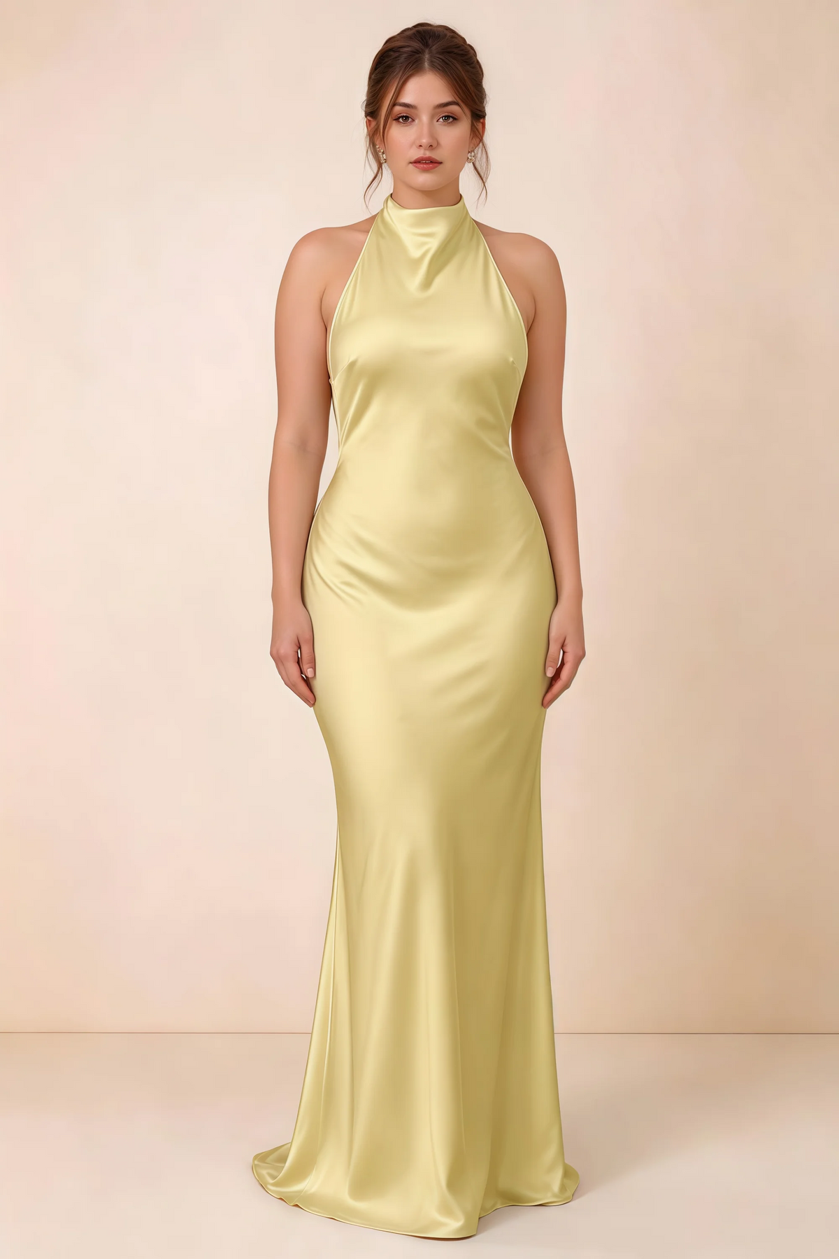 Full-length front view of the Astrid canary satin maxi dress, highlighting the body-skimming fit and gently flared hem.