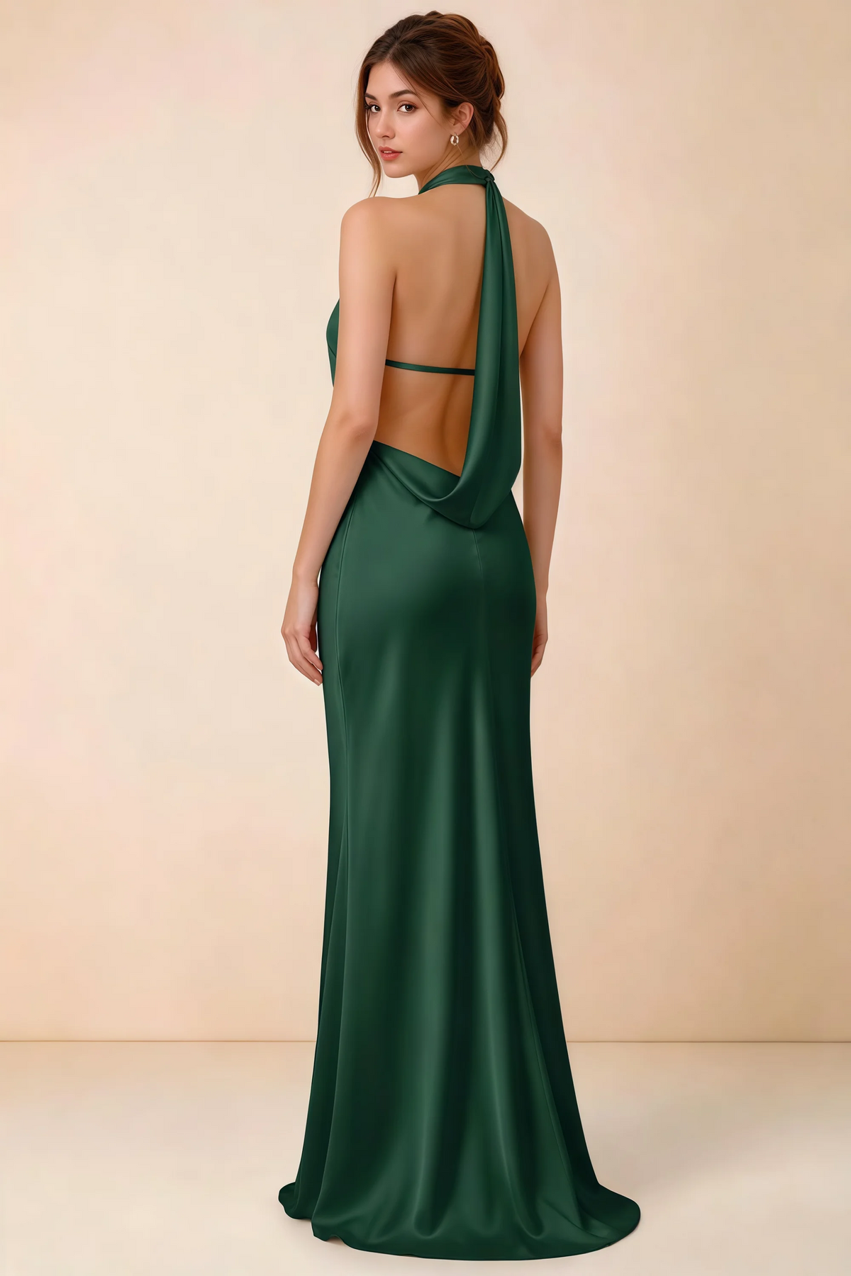 Back view of Astrid dark green satin halter maxi dress, highlighting the open draped back.