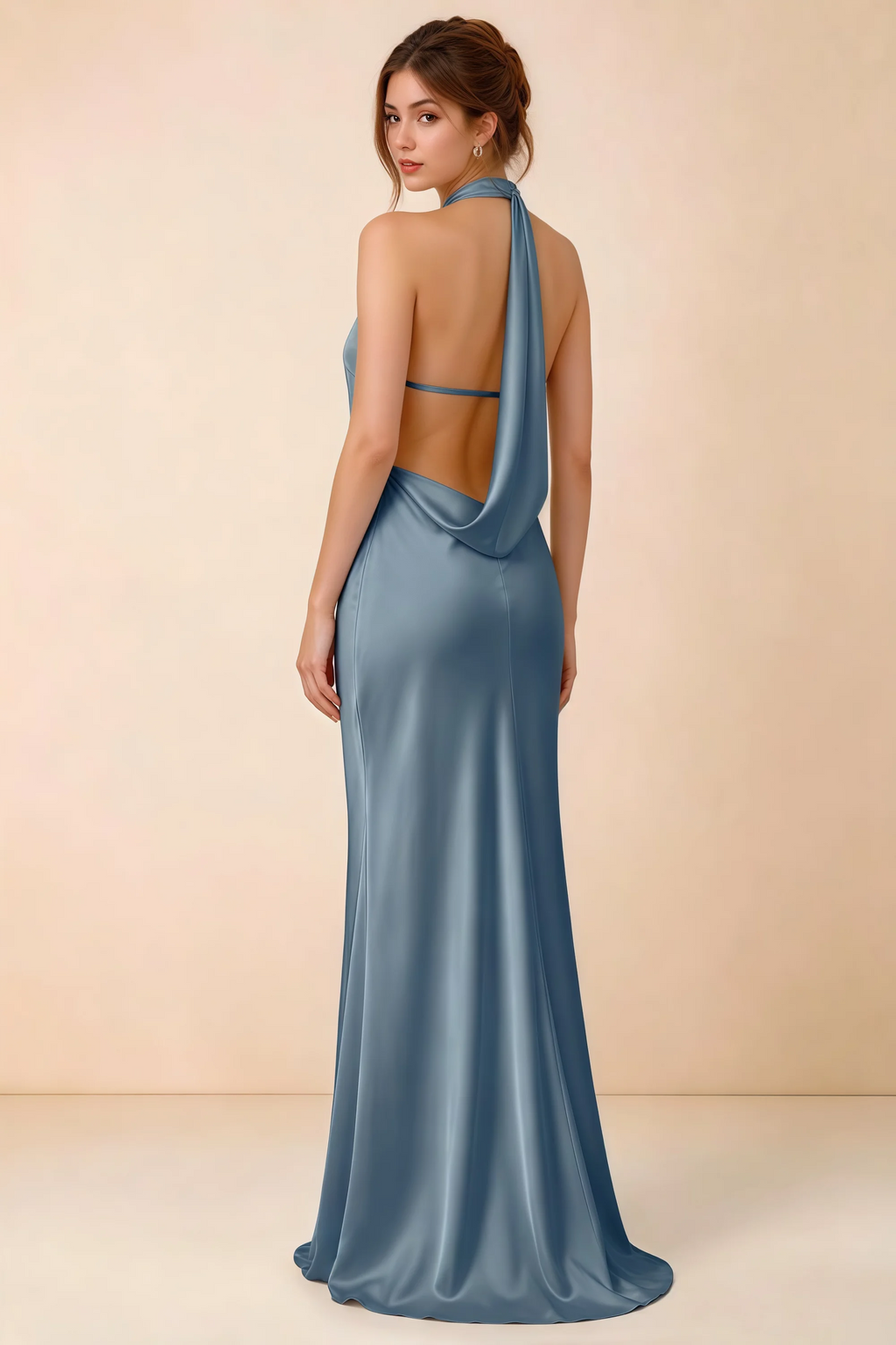 Back view of Astrid dusty blue satin halter maxi dress, highlighting the open draped back.