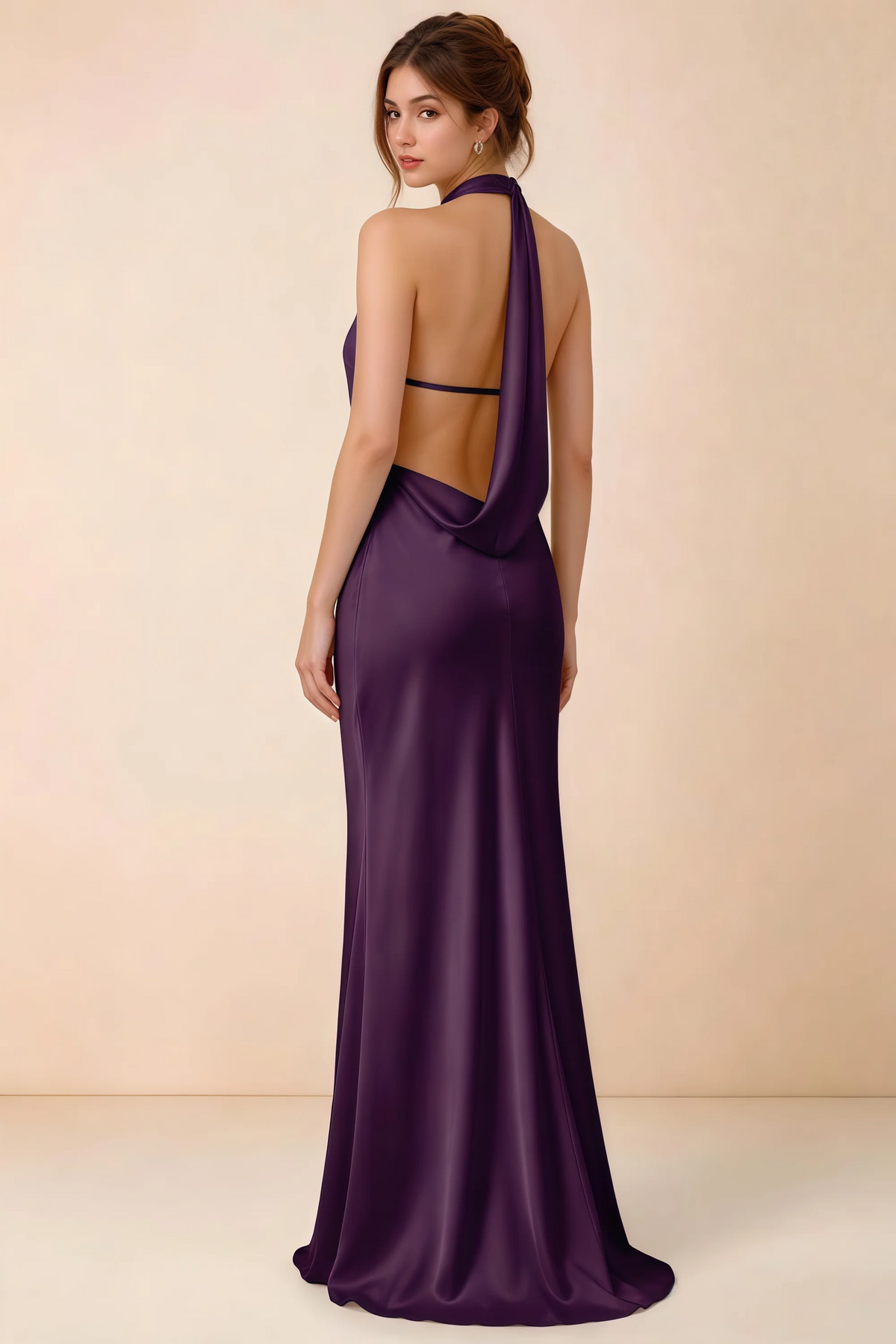 Back view of Astrid grape satin halter maxi dress, highlighting the draped open back.
