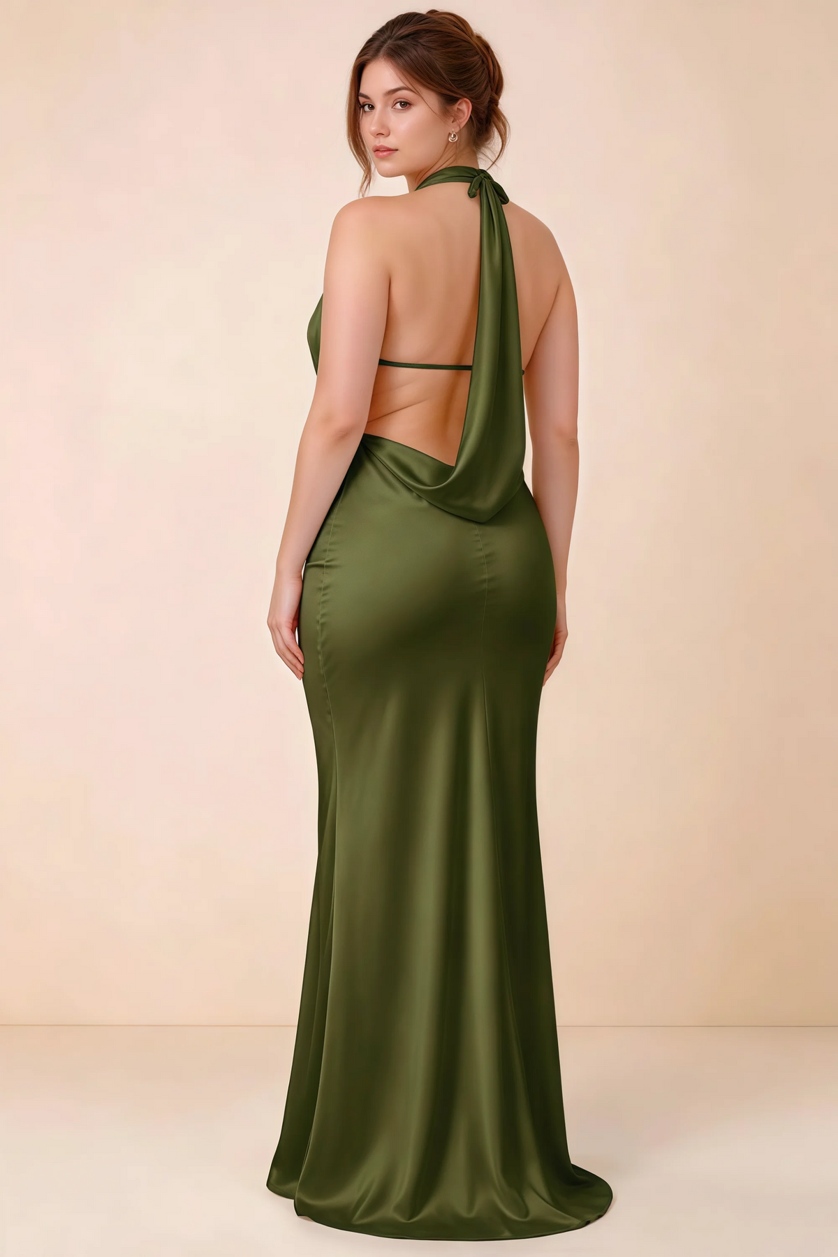 Rear three-quarter view of Astrid olive satin halter maxi dress, highlighting the open back.