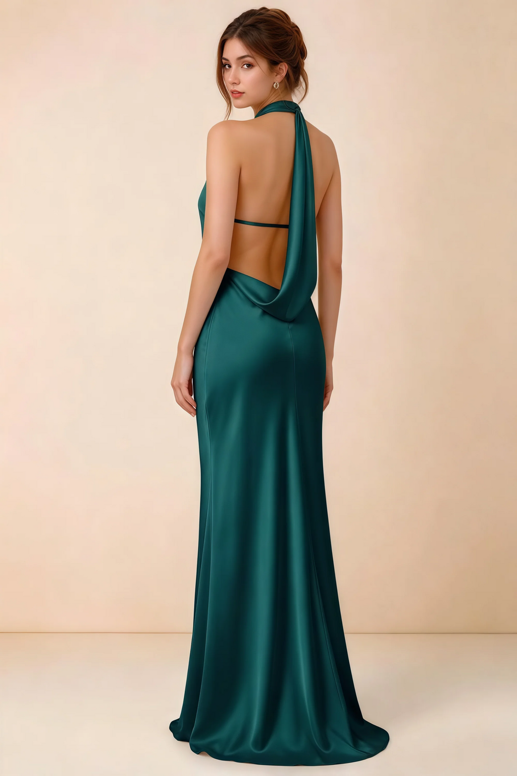 Back view of Astrid peacock satin halter maxi dress, highlighting the open draped back.