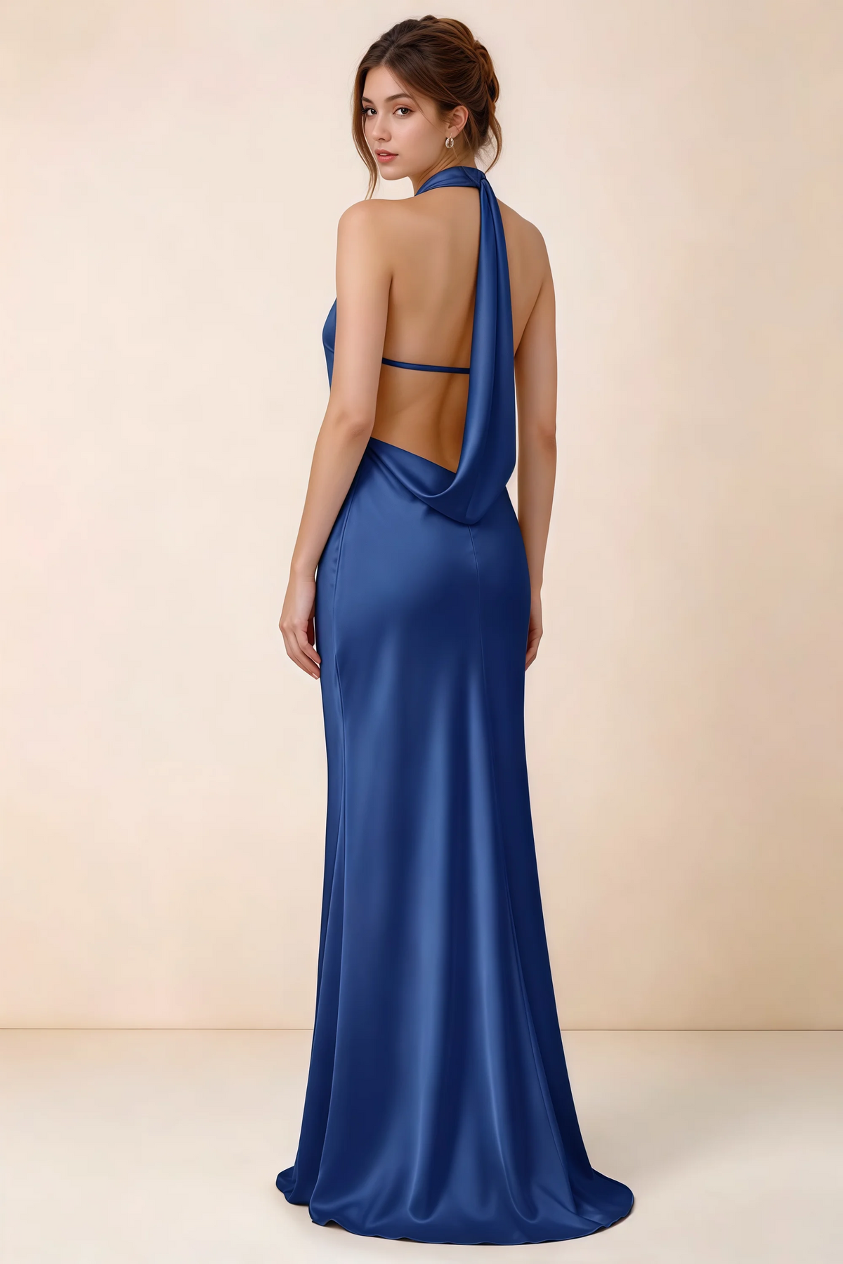 Back view of Astrid royal blue satin halter maxi dress, highlighting the draped open back.
