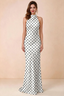 Front view of Astrid white polka dot halter maxi dress, showing the halter neckline.